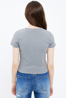 T-shirt court côtelé à bordure ondulé avec motif brodé rose