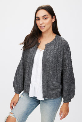 Cardigan en tricot torsadé ouvert à l'avant