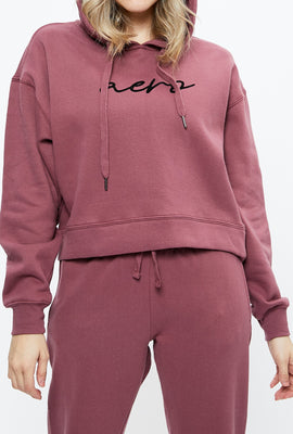 Haut à capuchon écourté à imprimé de logo signature